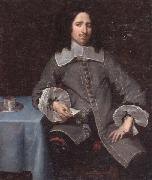 unknow artist Portrait of a gentleman,three-quarter length,standing beside a table oil painting